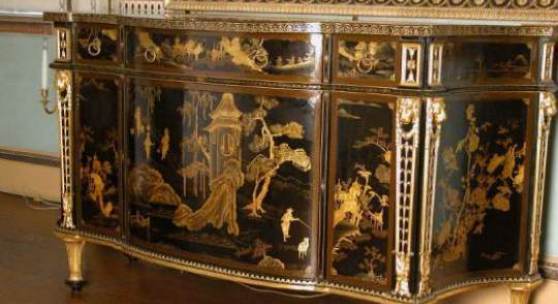 Commode with Chinese lacquer panels and English japanning, attributed to Chippendale, in the State Bed Chamber at Osterley. ©National Trust/Christopher Warleigh-Lack