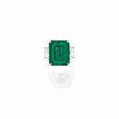 Lot 79 Property from an Important American Collection An Exceptional Emerald and Diamond Ring, Tiffany & Co. Centering an emerald-cut emerald weighing 12.03 carats, accented by two trapeze-cut diamonds Estimate $1/1.5 million Sold for $1,455,000