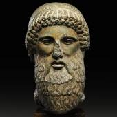 Lot 39 A Roman Black Marble Herm Head of Hermes, circa 2nd Century A.D.